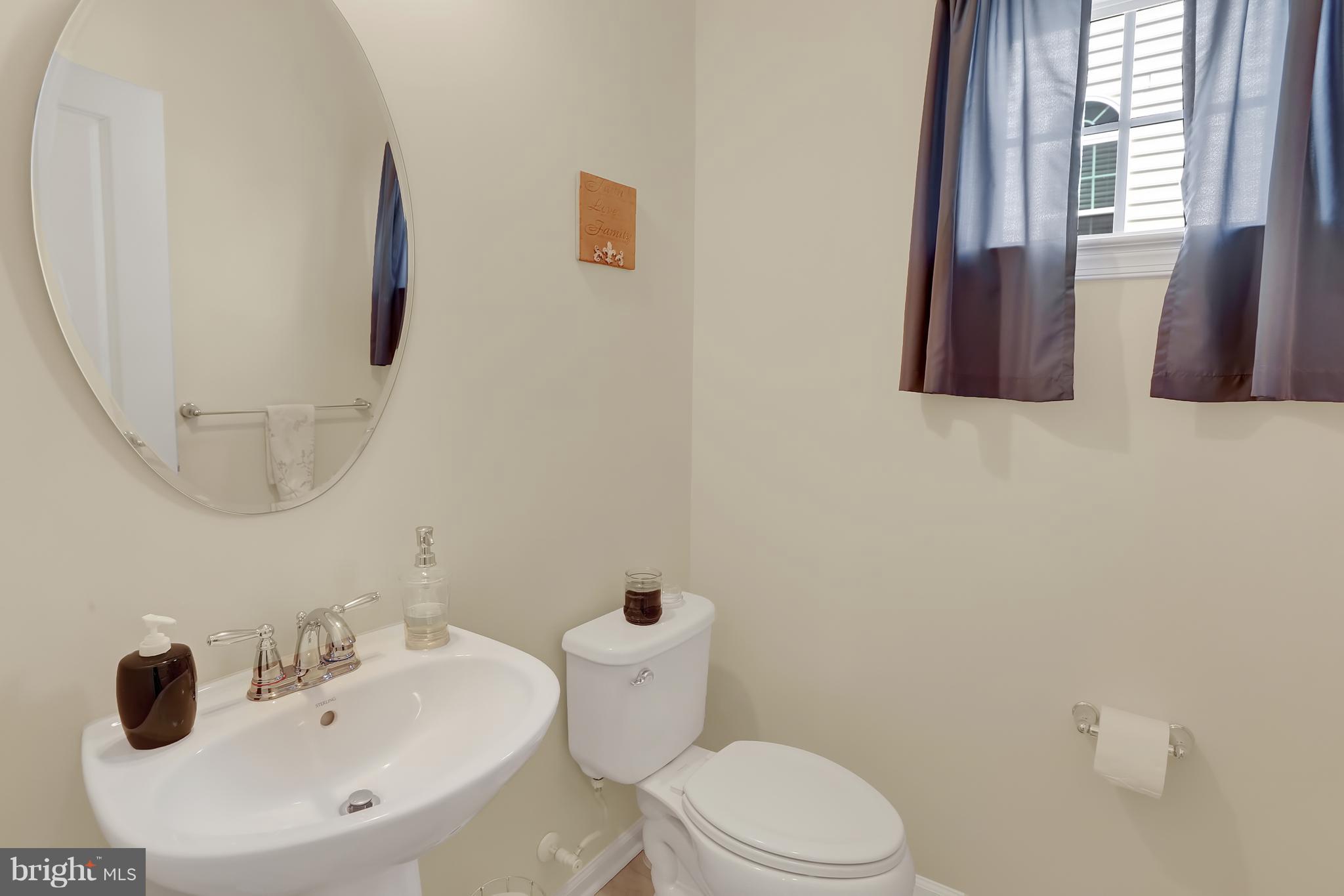 7208 Cherry Lane Laurel, MD 20707 - Photo 14 of 30 Main Level Powder Room!