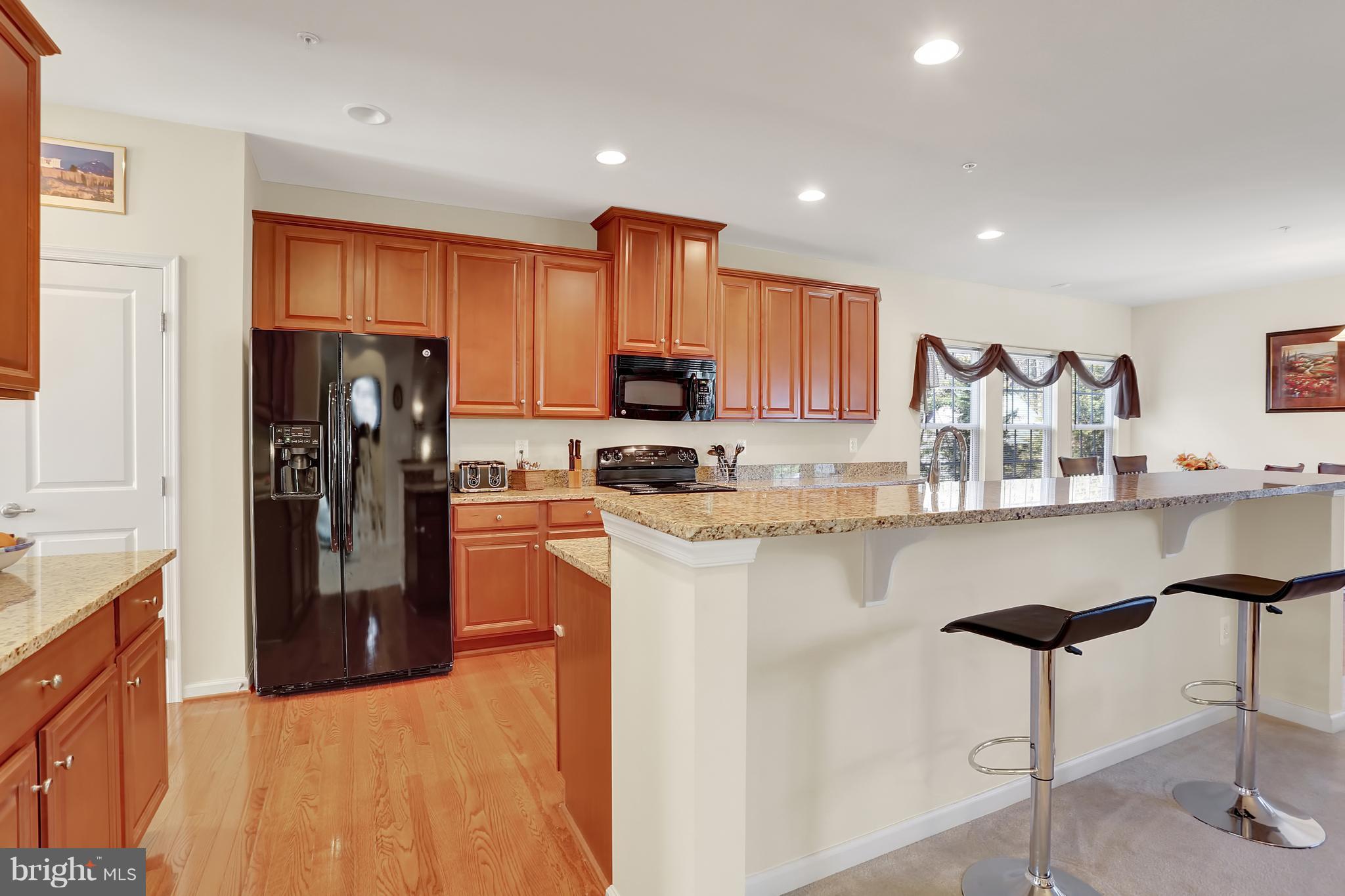 7208 Cherry Lane Laurel, MD 20707 - Photo 7 of 30 Granite with Breakfast Bar and Upgraded Cabinetry!