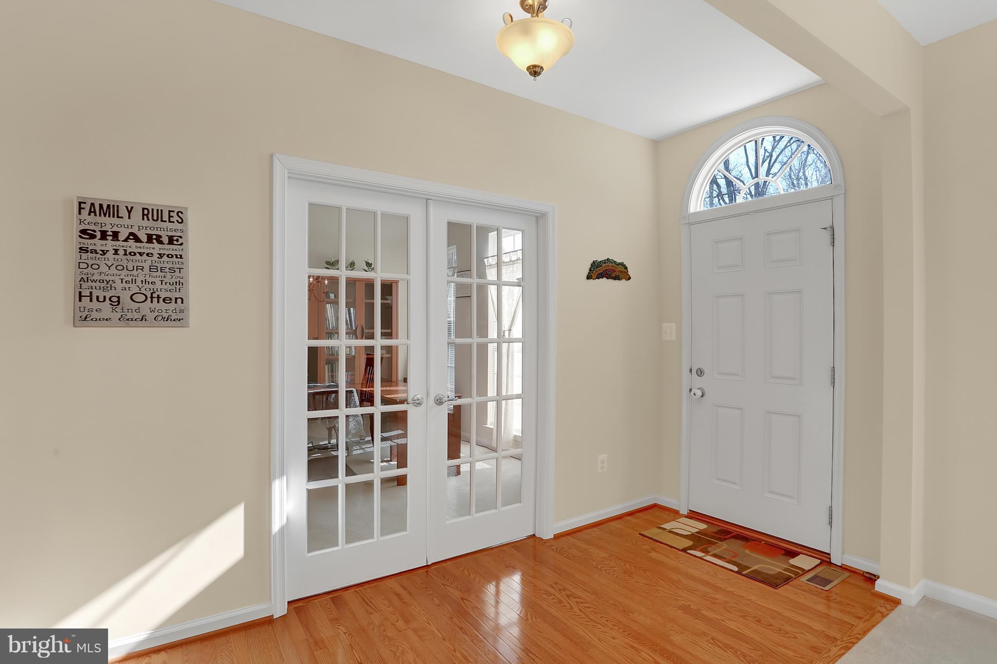7208 Cherry Lane Laurel, MD 20707 - Photo 9 of 30 Foyer with Hardwoods & French Doors to Office!