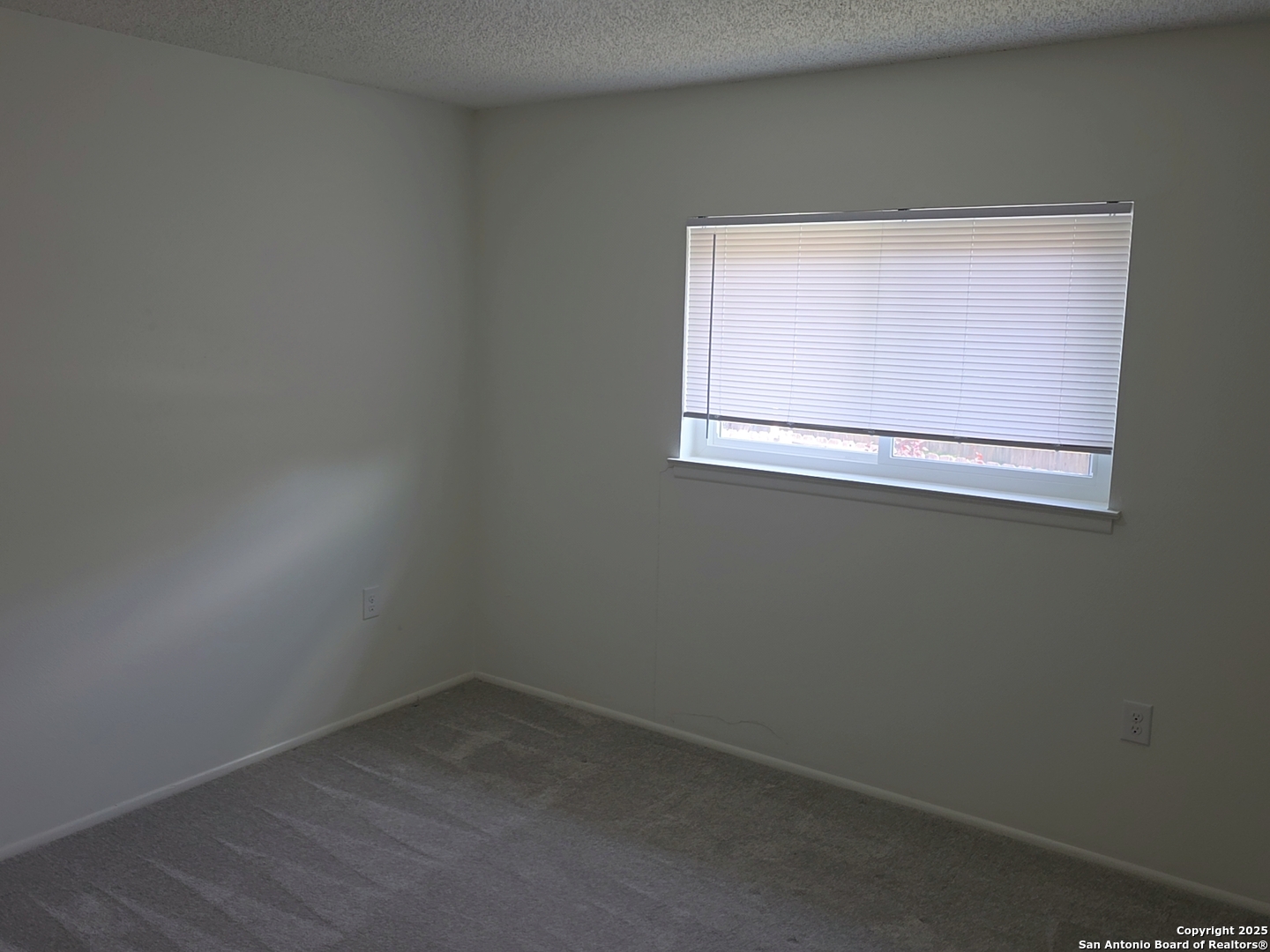 13339 Los Indios San Antonio, TX 78233 - Photo 12 of 17 an empty room with a window