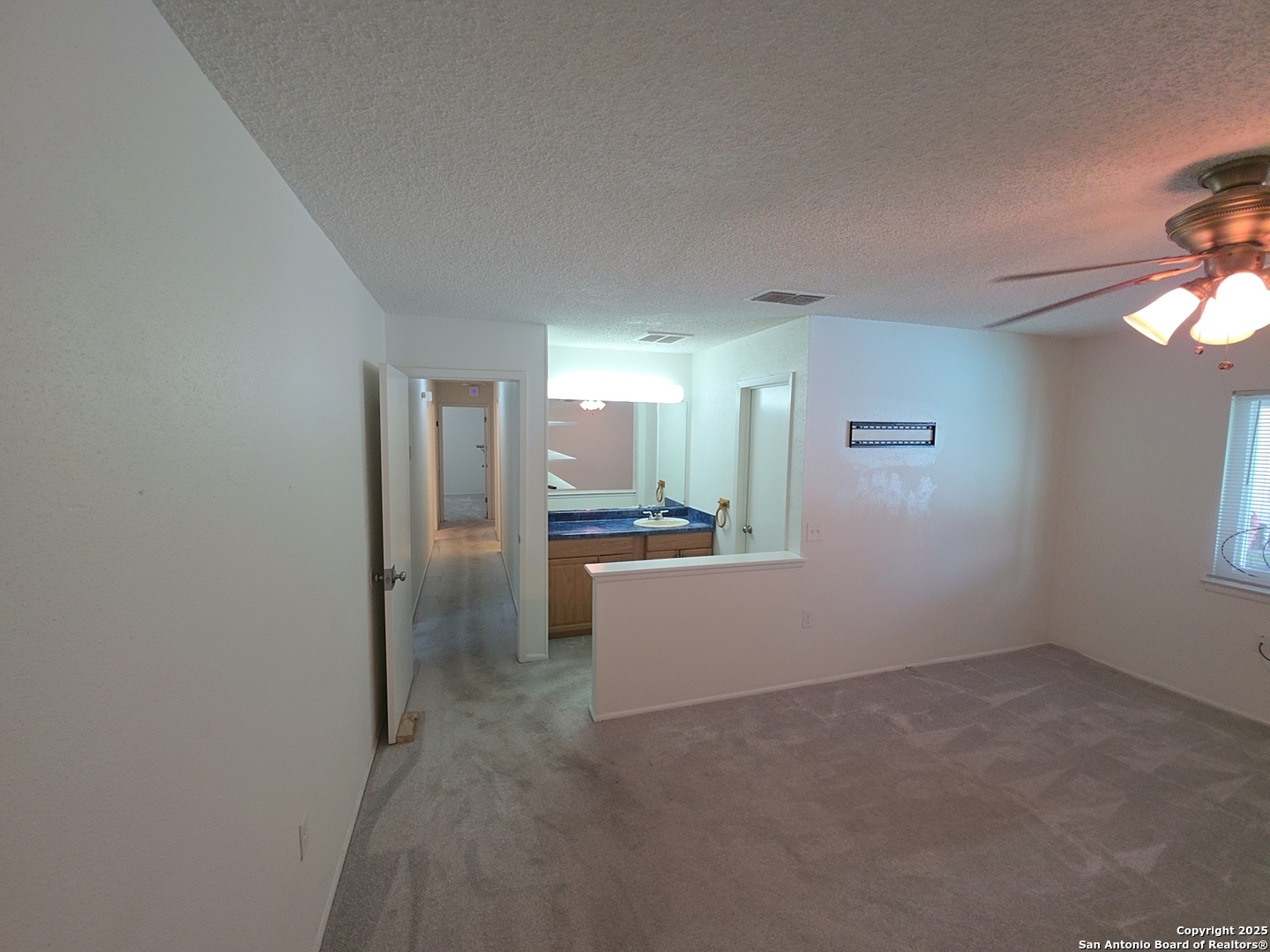 13339 Los Indios San Antonio, TX 78233 - Photo 14 of 17 a view of a kitchen cabinets and a refrigerator