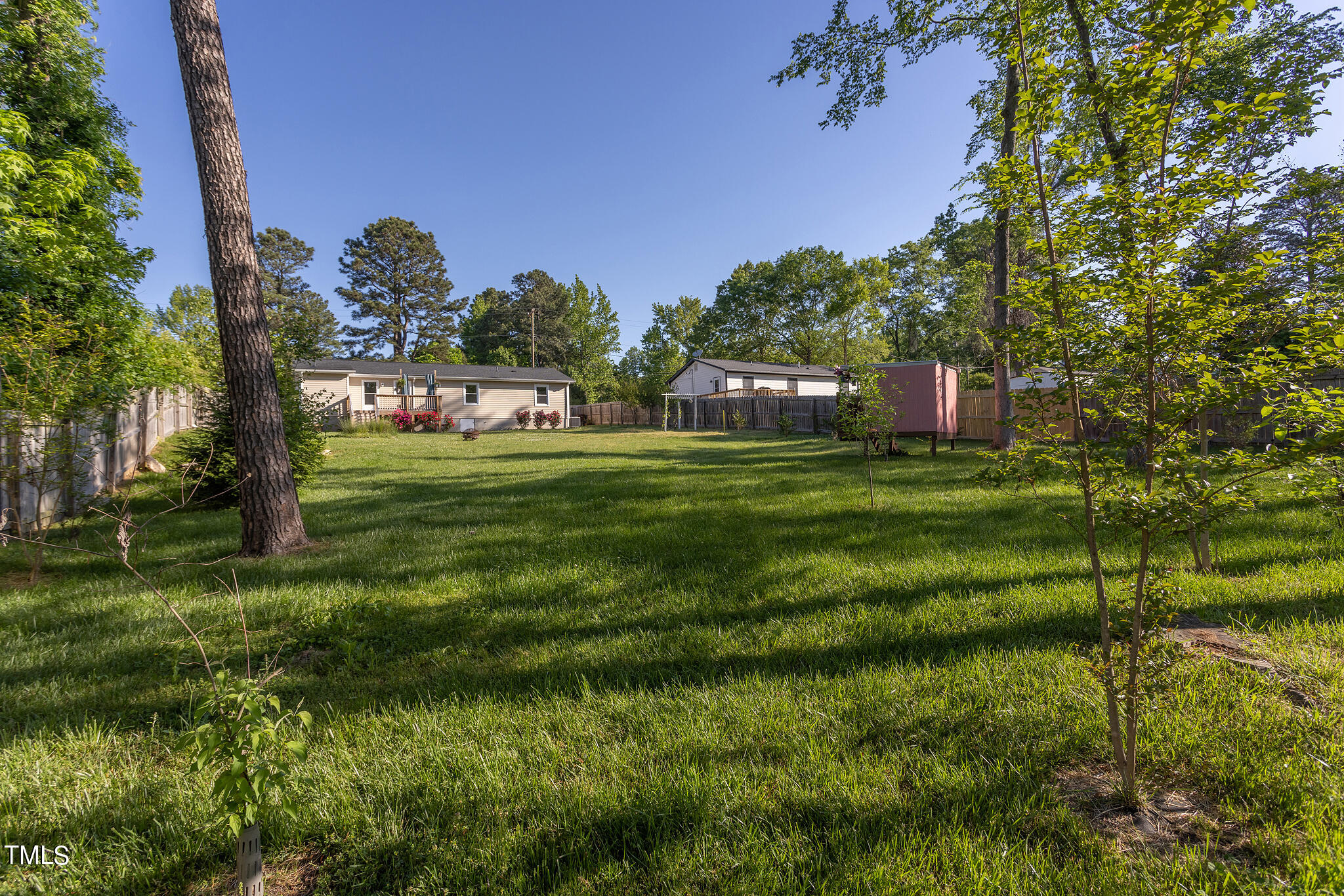 907 Cook Road Durham, NC 27713 - Photo 30 of 37 View of house from backyard