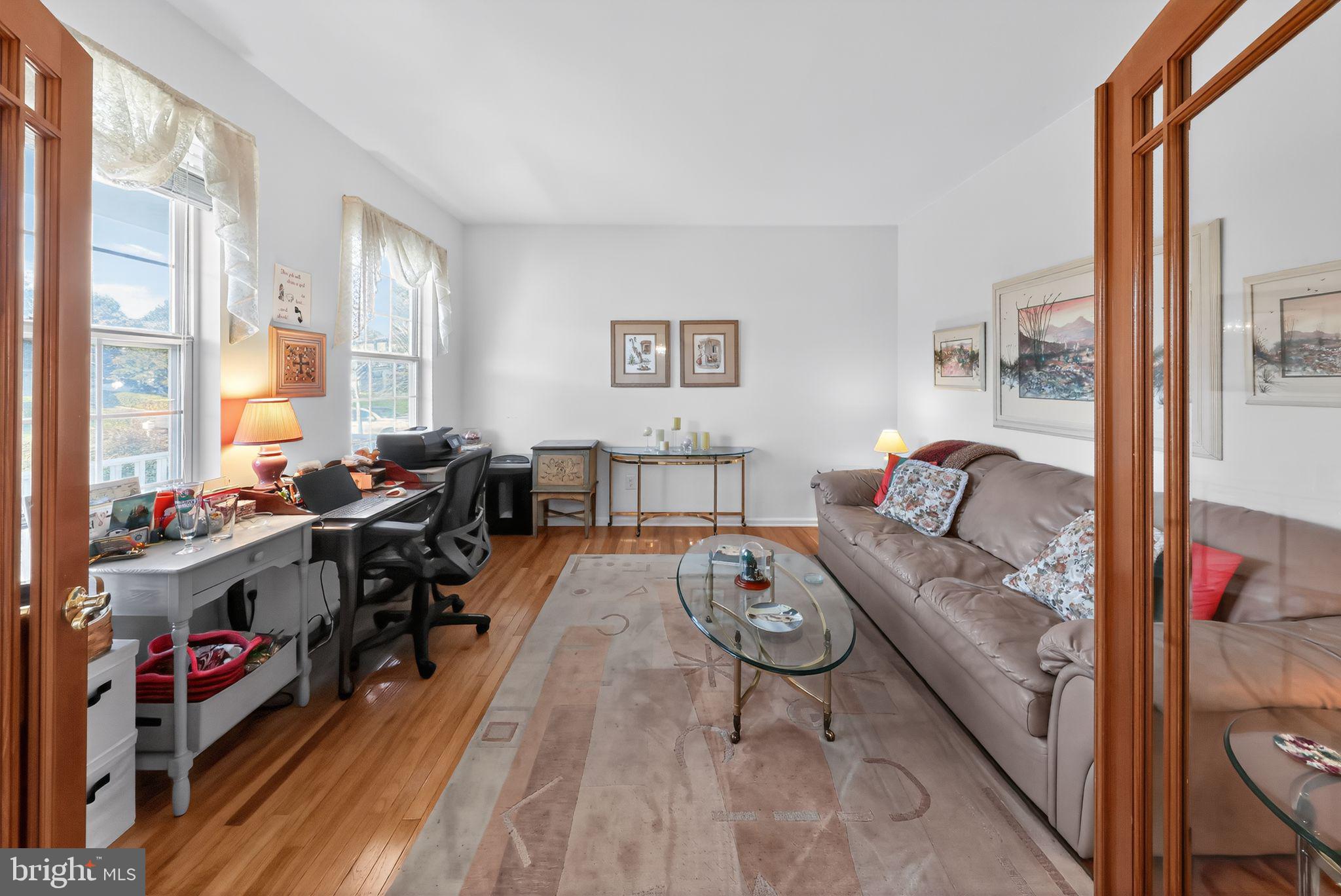 78 Emerald Ridge Drive Bear, DE 19701 - Photo 14 of 30 a living room with furniture and a gate