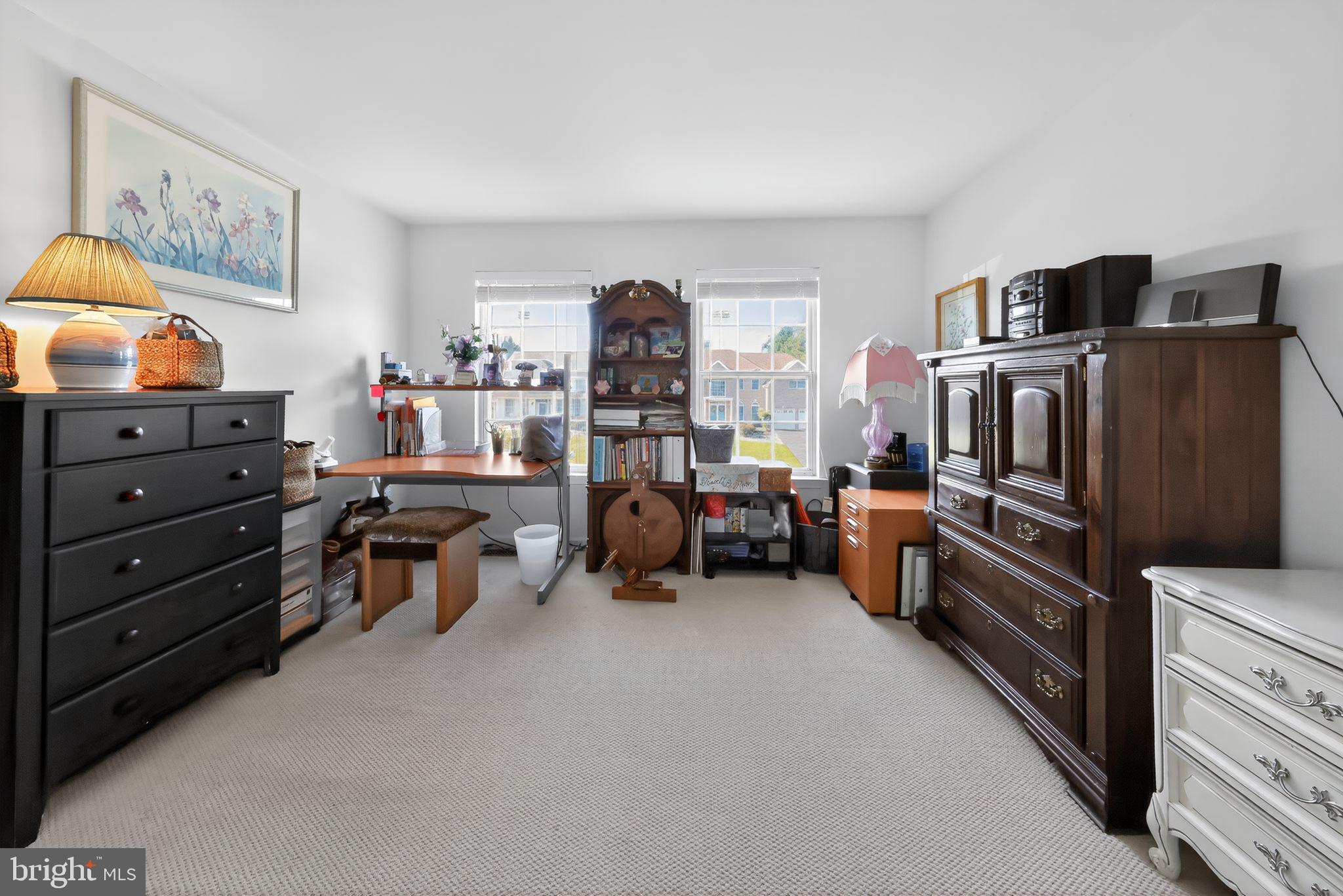 78 Emerald Ridge Drive Bear, DE 19701 - Photo 24 of 30 a view of a livingroom with furniture and toys