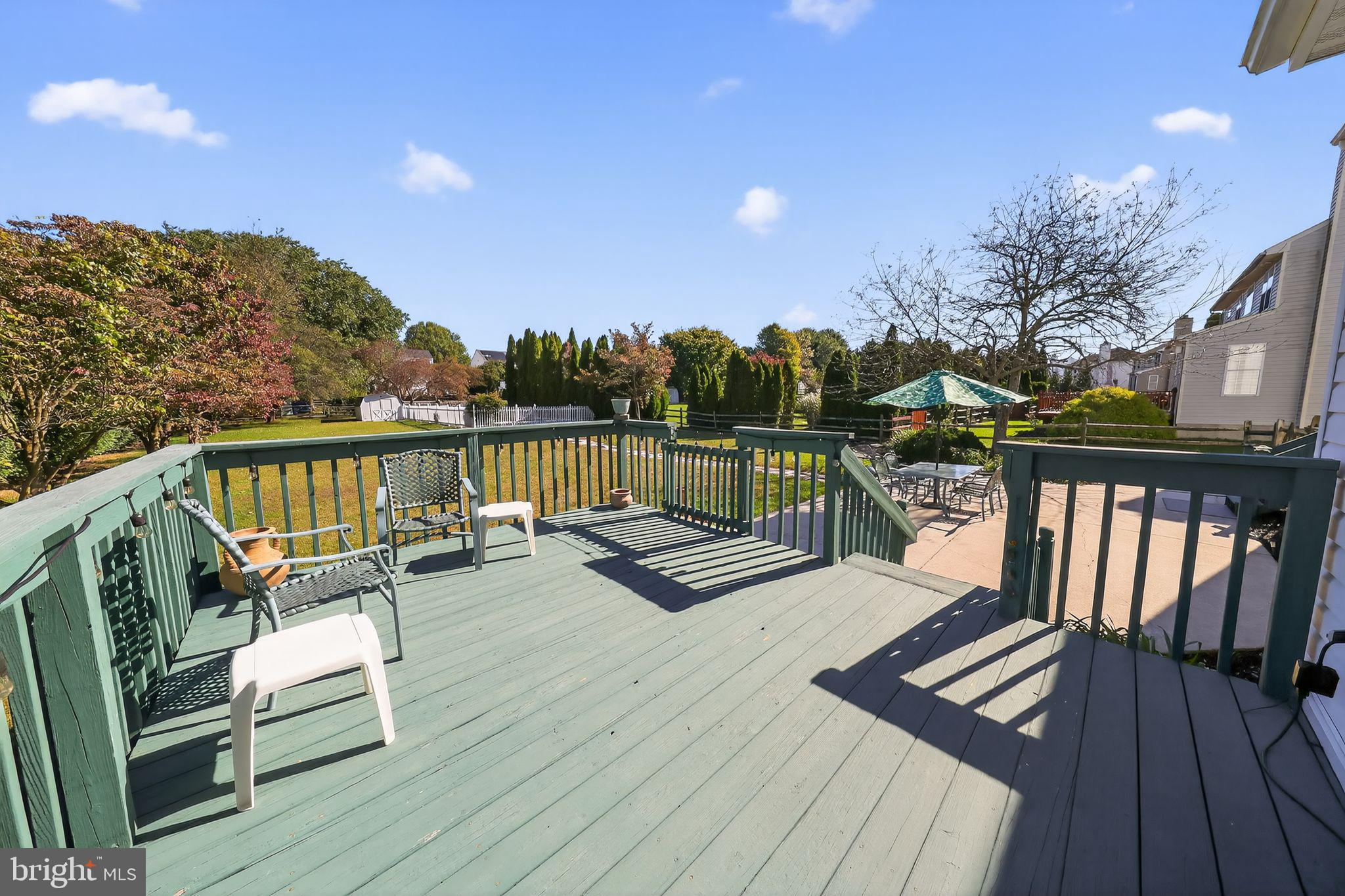 78 Emerald Ridge Drive Bear, DE 19701 - Photo 28 of 30 a view of a roof deck with couches and wooden floor