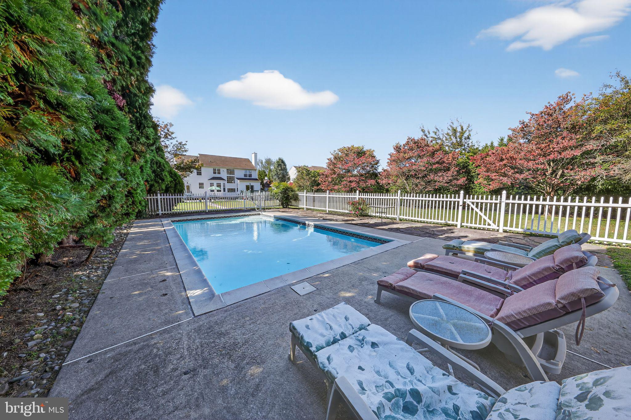 78 Emerald Ridge Drive Bear, DE 19701 - Photo 29 of 30 a view of a patio with couches chairs and a potted plant