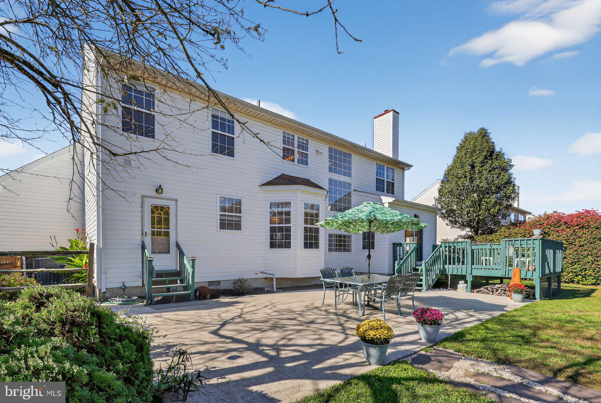 78 Emerald Ridge Drive Bear, DE 19701 - Photo 30 of 30 a view of a house with sitting area and garden
