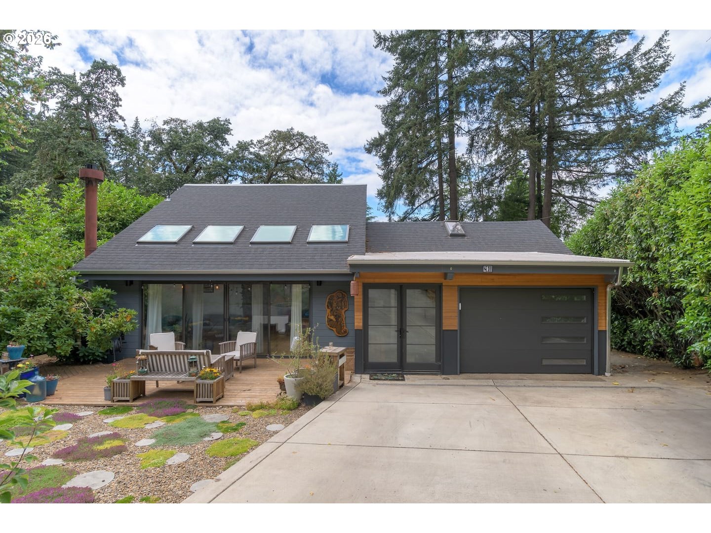 2011 Elk Avenue Eugene, OR 97403 - Photo 1 of 2 a house view with a garden space