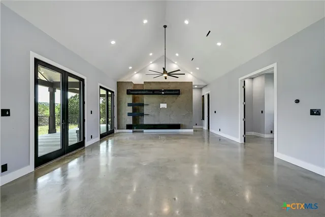 a bathroom with a double vanity sink and mirror