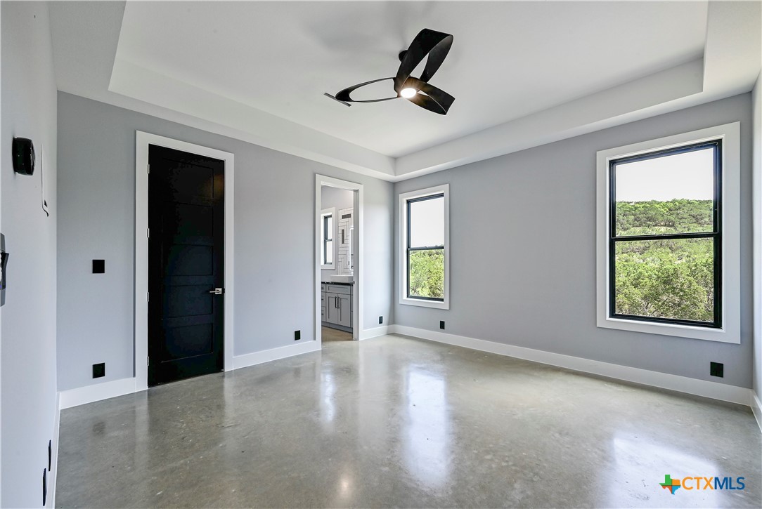 304 Spring Hollow Drive Bertram, TX 78605 - Photo 25 of 45 a view of an empty room with a window