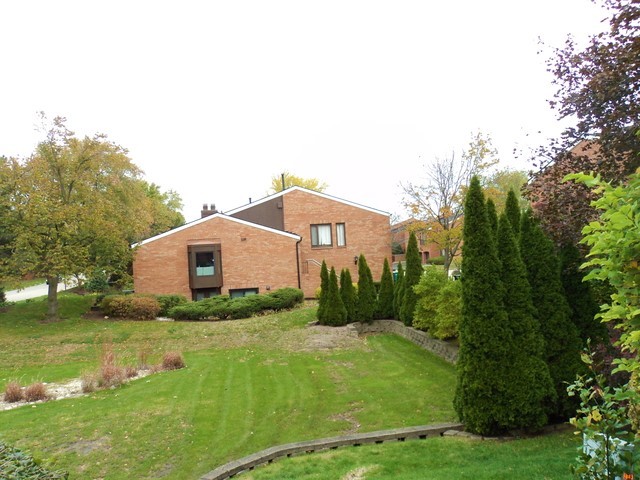 19-w286 Governors Trail Oak Brook, IL 60523 - Photo 17 of 17 a house view with a garden space