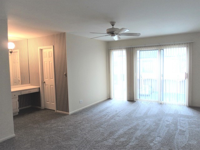 19-w286 Governors Trail Oak Brook, IL 60523 - Photo 8 of 17 a view of an empty room with a window