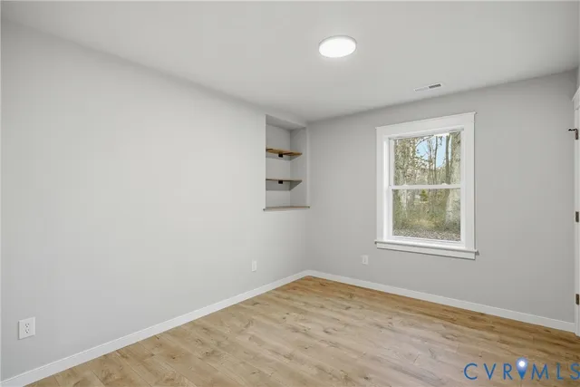 an empty room with a window