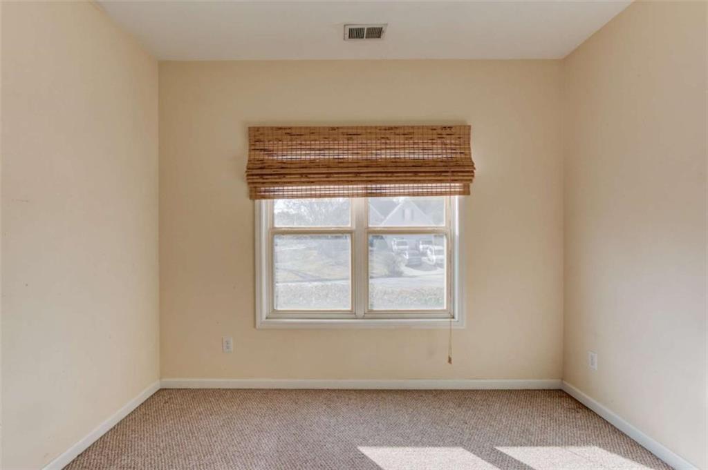 3322 Henderson View Court Southwest Loganville, GA 30052 - Photo 27 of 47 an empty room with a window