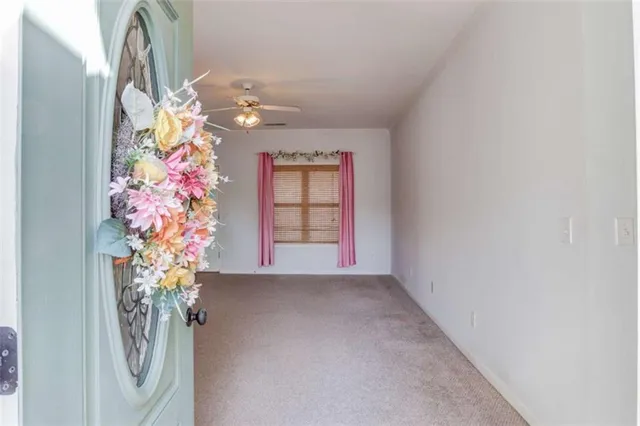 a view of entryway with wooden floor