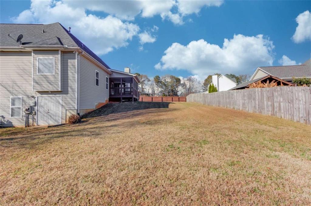 3322 Henderson View Court Southwest Loganville, GA 30052 - Photo 43 of 47 a view of a house with a yard