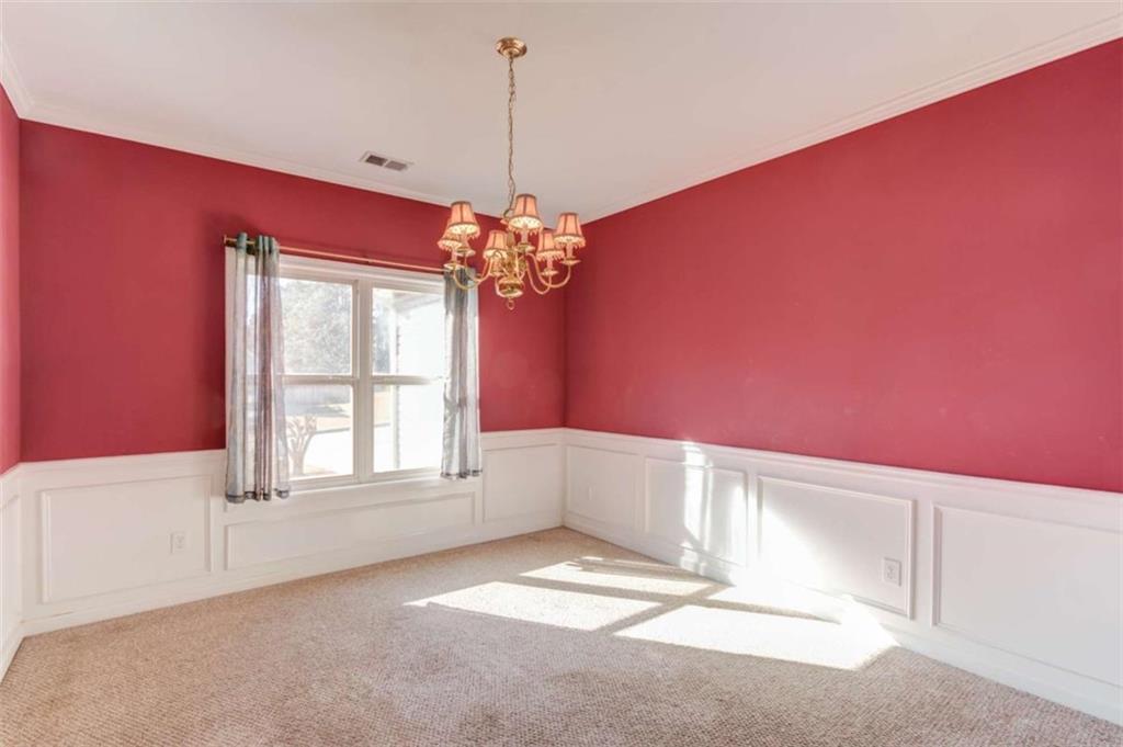 3322 Henderson View Court Southwest Loganville, GA 30052 - Photo 6 of 47 a view of an empty room with a window