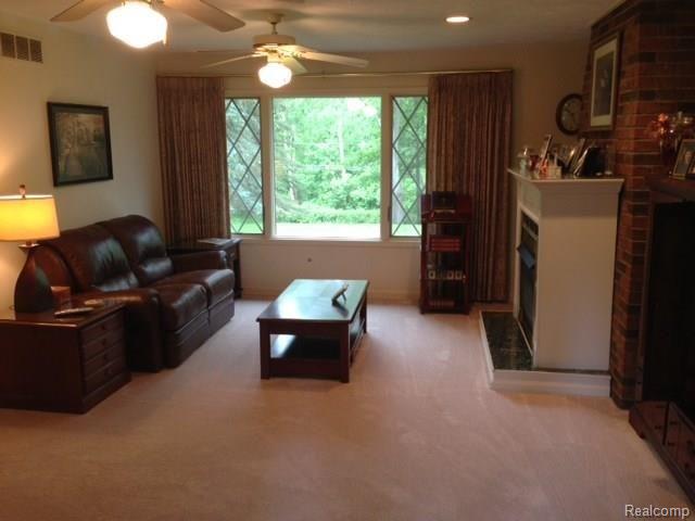 2198 West Barron Road Howell, MI 48855 - Photo 12 of 25 family room with firepace