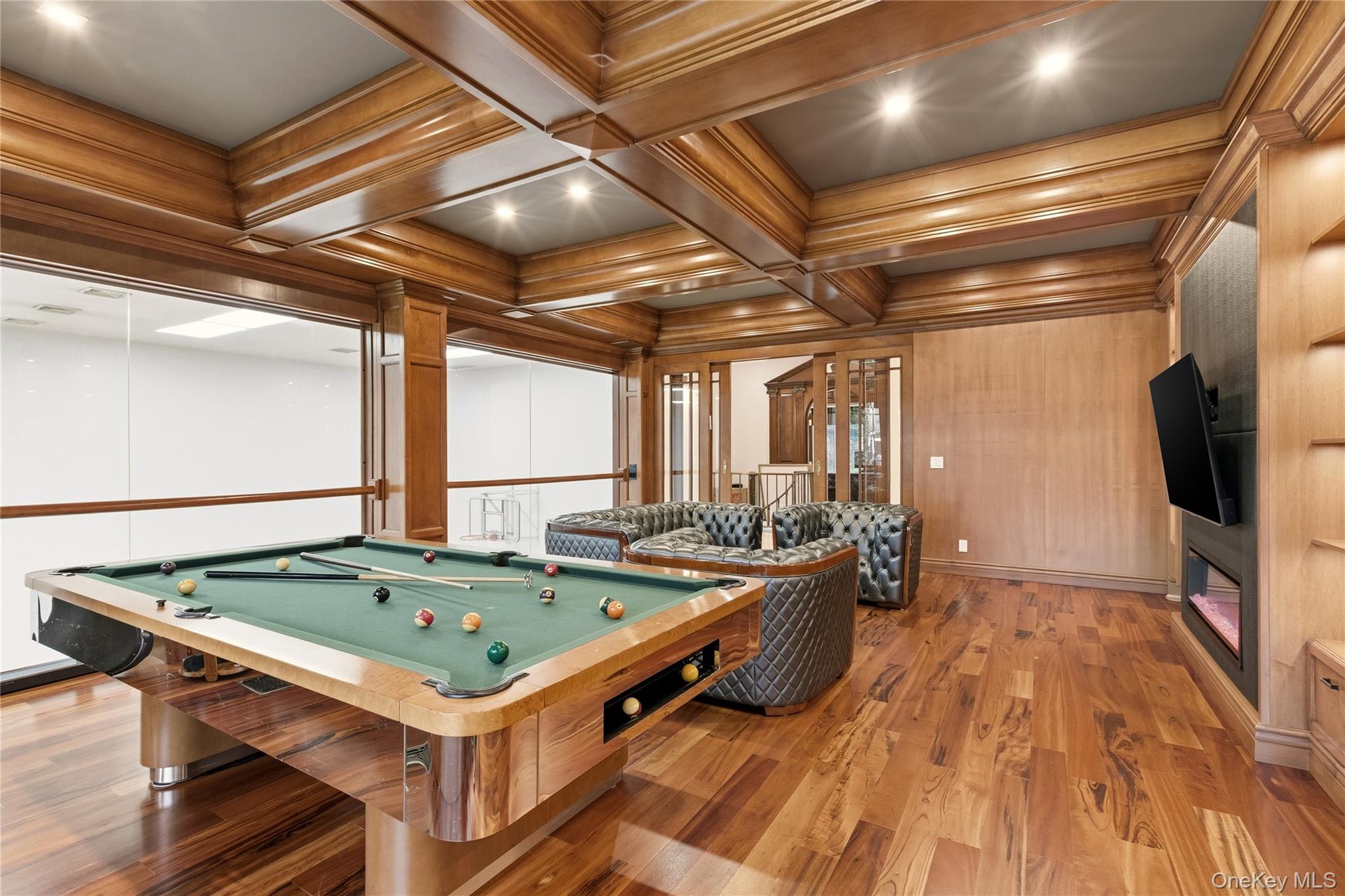 55 Coves Run Syosset, NY 11791 - Photo 21 of 50 a room with pool table and flat screen tv