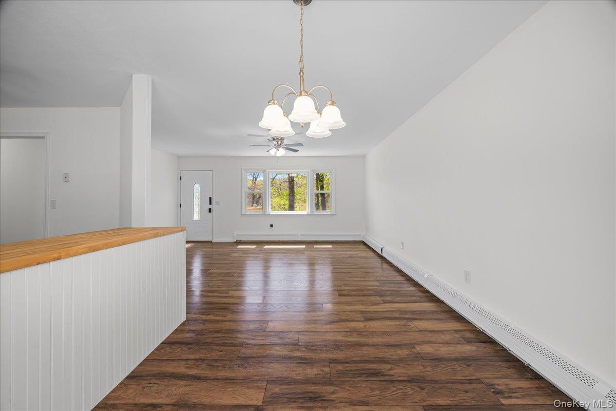 1168 Lakes Road Monroe, NY 10950 - Photo 9 of 41 Dining room flows seamlessly into the living room and kitchen.