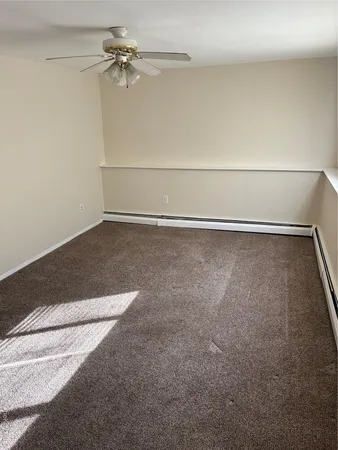 a view of a room with an empty space