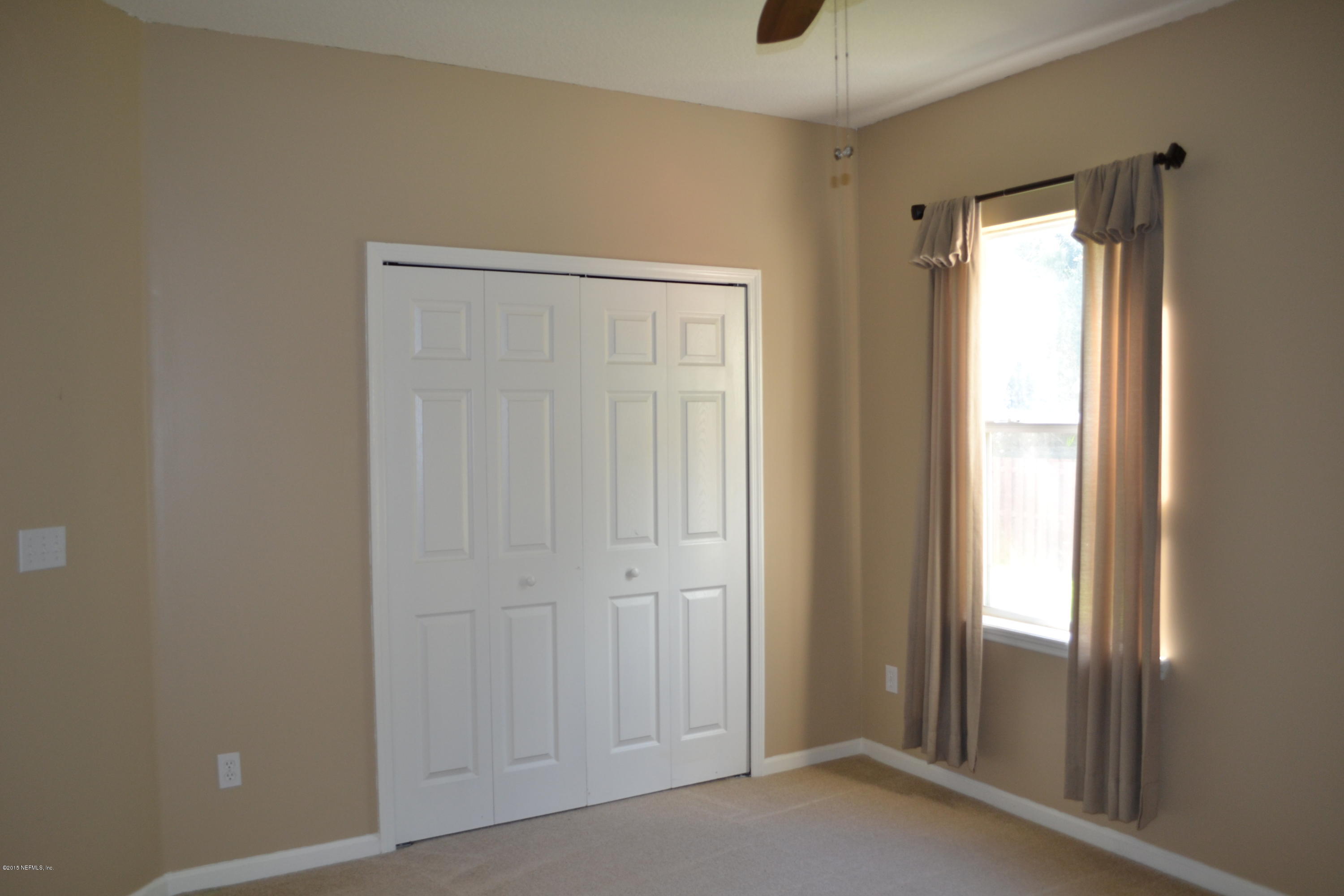 14422 Millhopper Road Jacksonville, FL 32258 - Photo 35 of 65 a view of an empty room