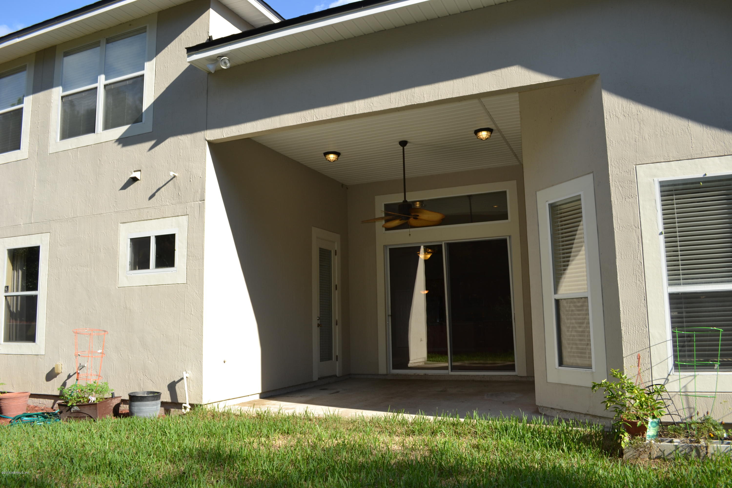 14422 Millhopper Road Jacksonville, FL 32258 - Photo 50 of 65 a front view of a house with a yard