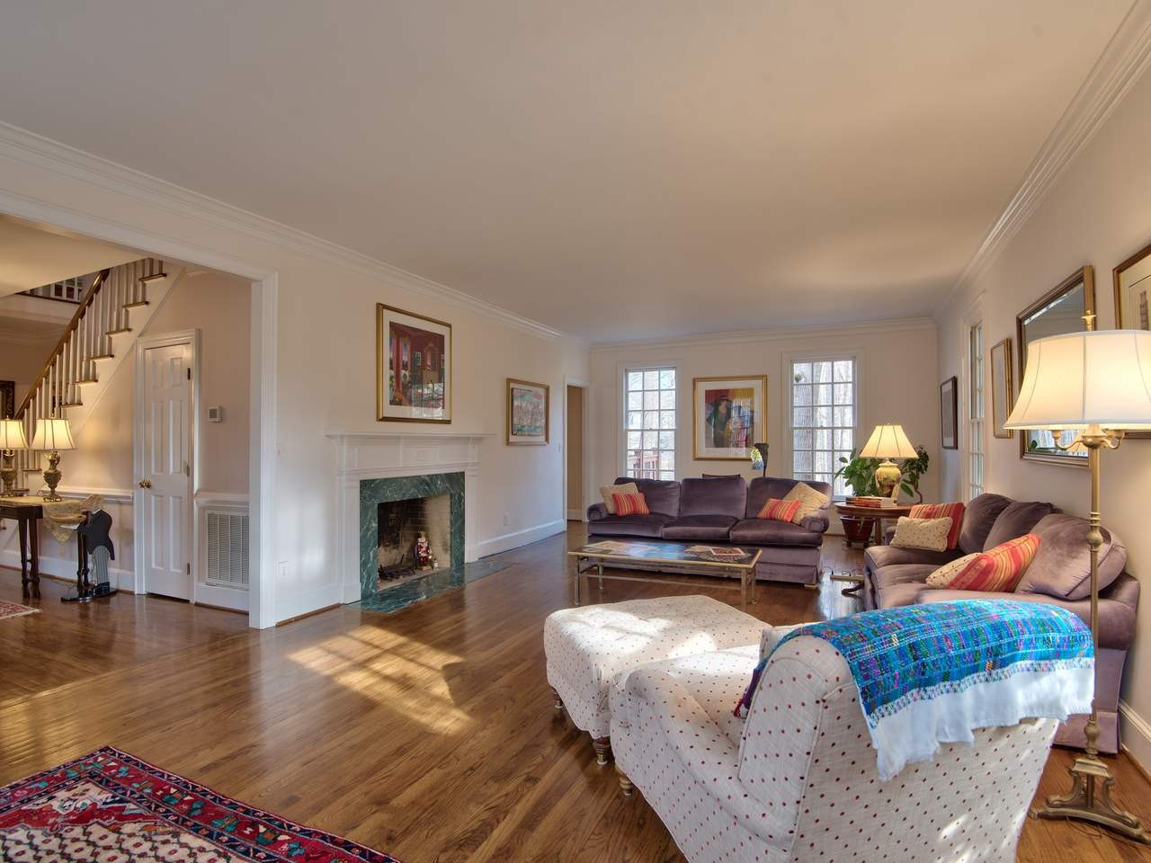 3809 Chippenham Road Durham, NC 27707 - Photo 4 of 23 Masonry fireplace is focus in this light filled room with beautiful oak floors. Living Room
