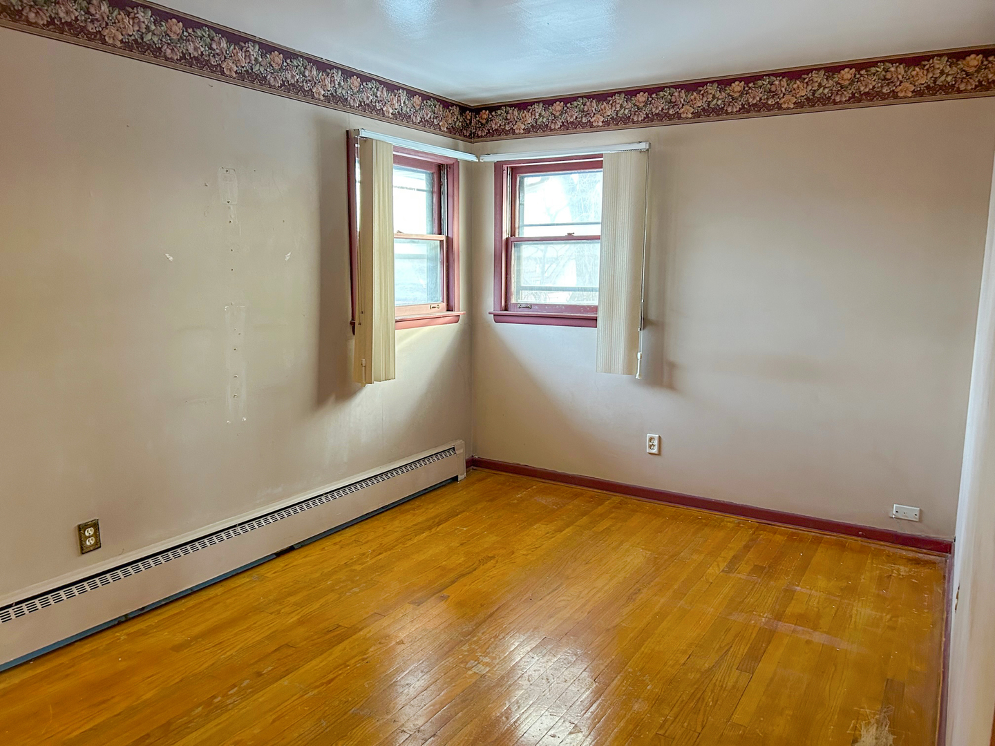 12919 South Escanaba Avenue Chicago, IL 60633 - Photo 14 of 16 a view of an empty room with a window