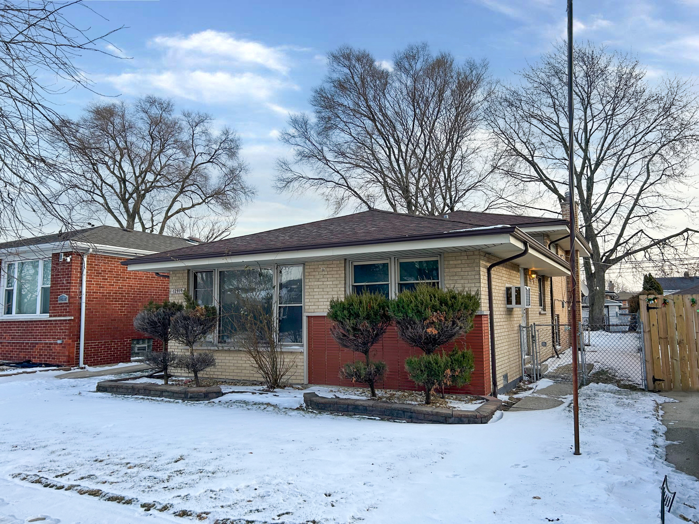 12919 South Escanaba Avenue Chicago, IL 60633 - Photo 3 of 16 a view of a house with backyard porch and sitting area