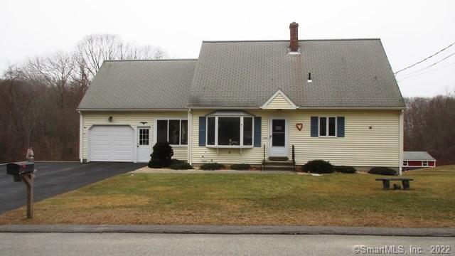 302 Hazelnut Hill Road Groton, CT 06340 - Photo 1 of 1 a front view of a house with a yard