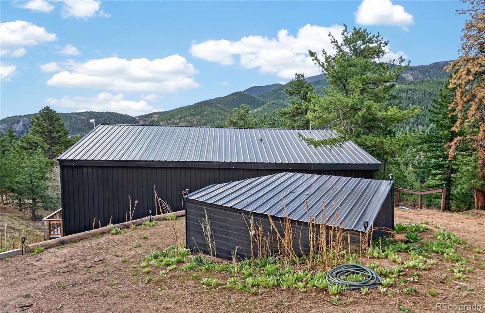 161 Highland Circle Rye, CO 81069 - Photo 7 of 26 a view of a backyard with a garden