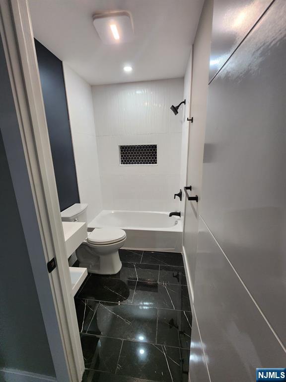 93 Hughes Street, Unit 2 Maplewood, NJ 07040 - Photo 14 of 16 a bathroom with a toilet and a shower