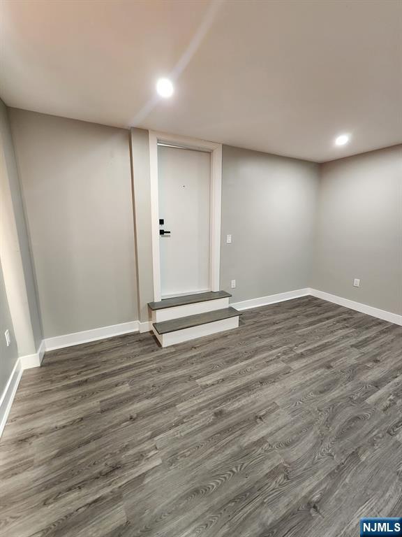 93 Hughes Street, Unit 2 Maplewood, NJ 07040 - Photo 2 of 16 wooden floor in an empty room with wooden floor
