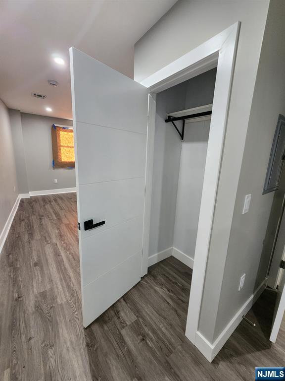 93 Hughes Street, Unit 2 Maplewood, NJ 07040 - Photo 4 of 16 a view of empty room with wooden floor