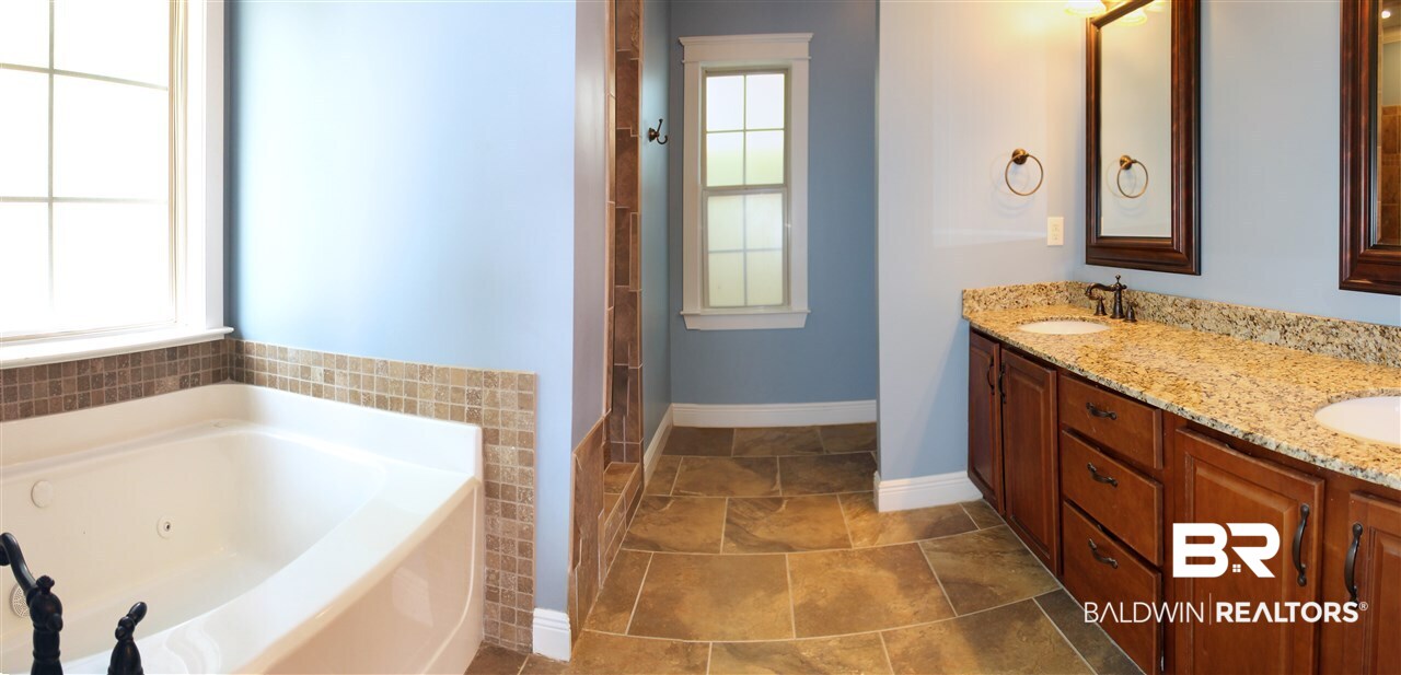 3512 Rue Royal Mobile, AL 36693 - Photo 14 of 21 Master bath with double vanity and whirpool tub