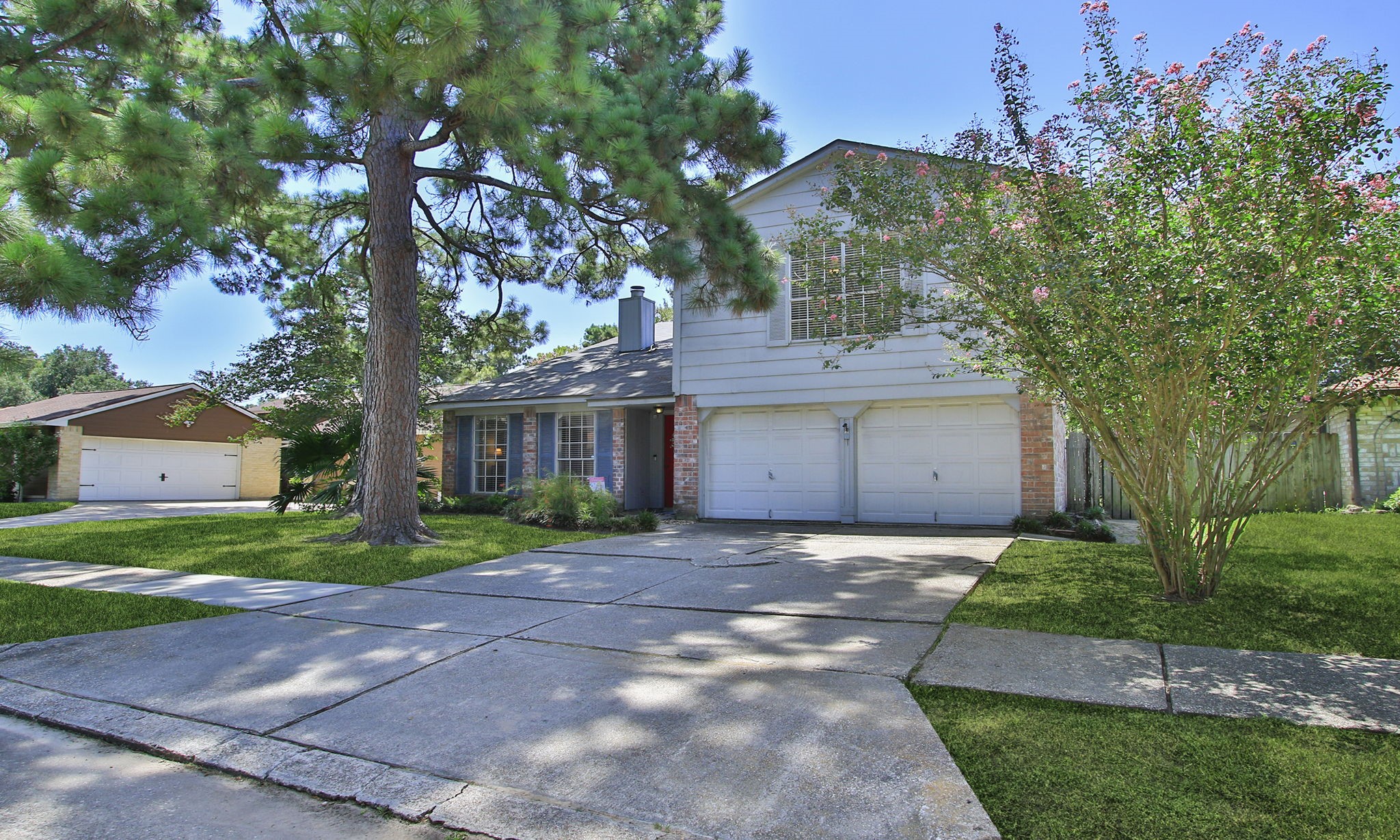 4835 Ingleside Court Spring, TX 77388 - Photo 2 of 50 4835 Ingleside Ct. - Landscaped yard with mature trees.