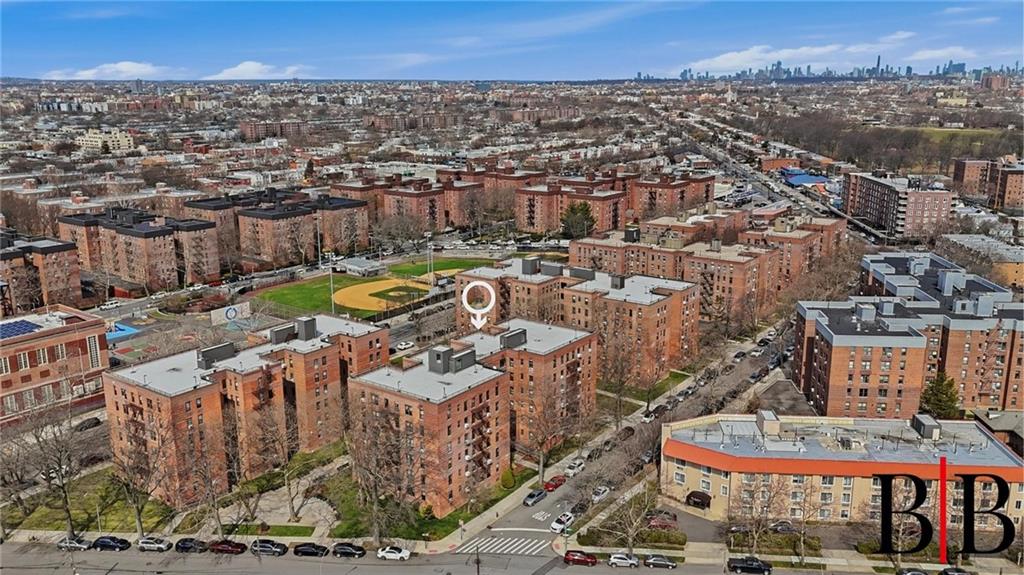 2270 Plumb 1 Street, Unit 2D Brooklyn, NY 11229 - Photo 11 of 13 an aerial view of a house with a swimming pool