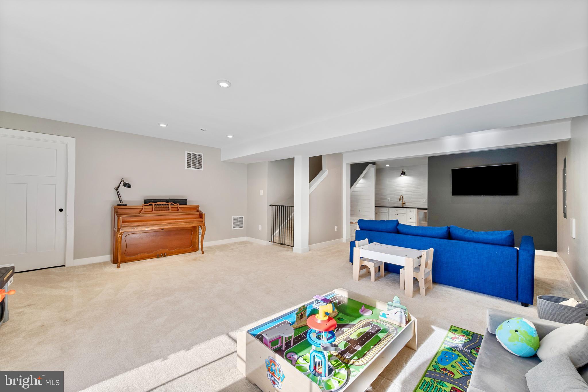 124 Emperor Drive White Post, VA 22663 - Photo 14 of 28 a living room with furniture and a flat screen tv