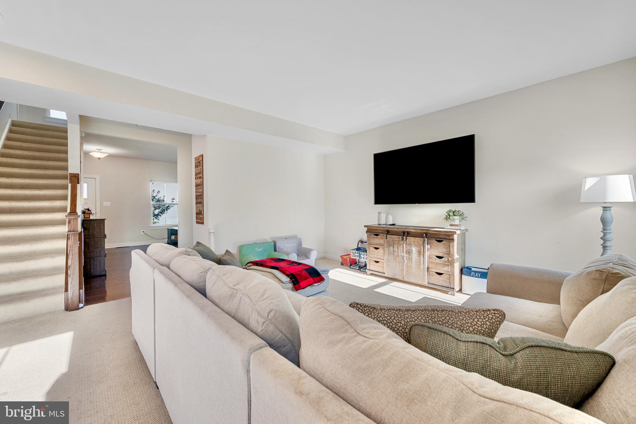 124 Emperor Drive White Post, VA 22663 - Photo 3 of 28 a living room with furniture and a flat screen tv