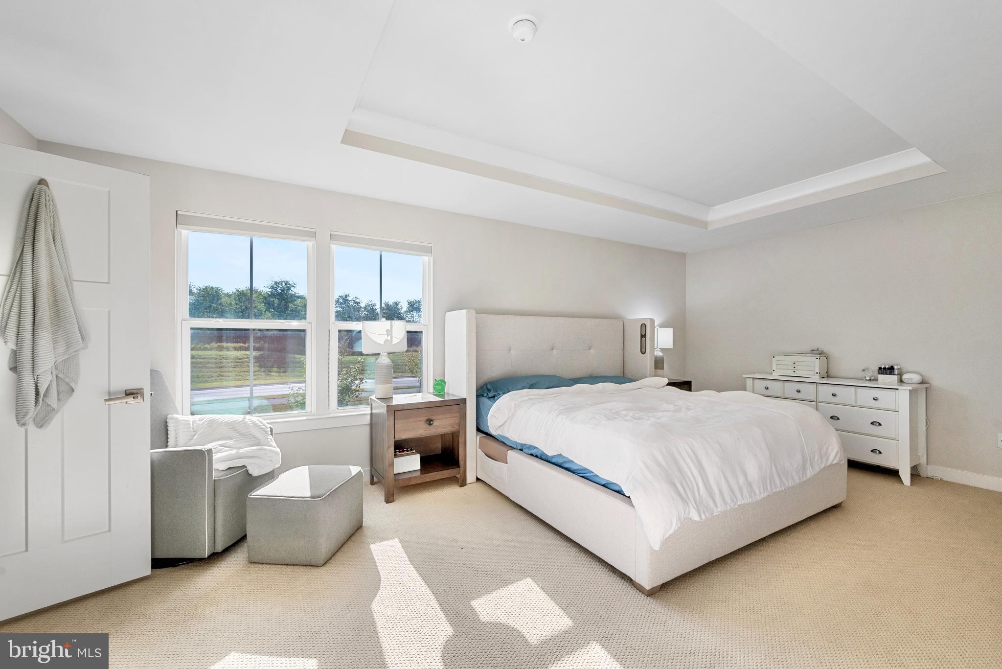 124 Emperor Drive White Post, VA 22663 - Photo 8 of 28 a bedroom with a large bed and a large window