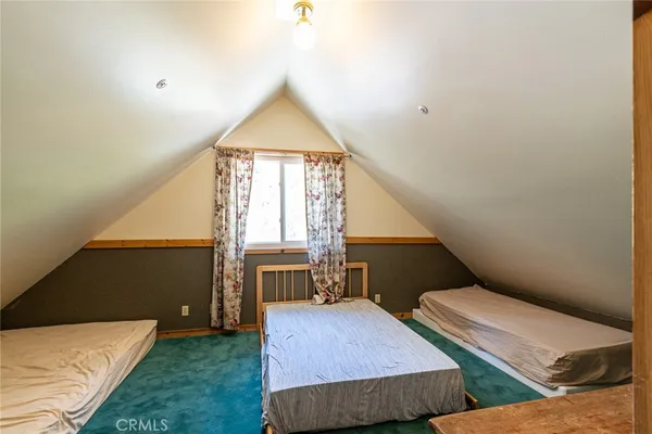 a dining room with a table and chairs