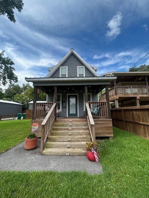 3020 Calhoun Street Bacliff, TX 77518 - Photo 2 of 14 a view of a house with wooden deck and furniture