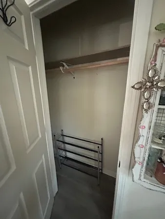 a view of a room with racks on the wall