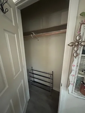 a view of a room with racks on the wall