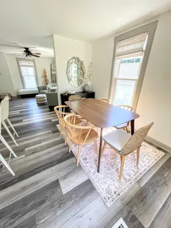 a view of a living room and dining room