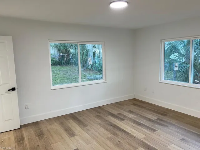 a view of a room that has a window in it