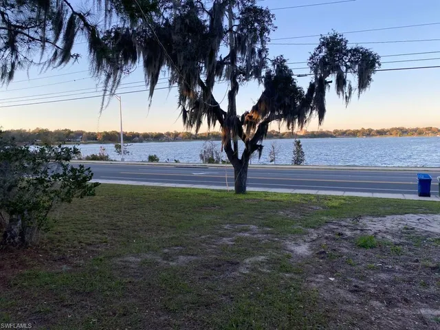 a view of backyard with green space