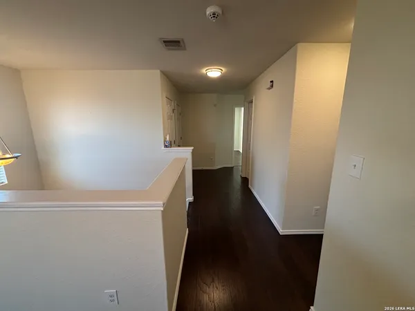 a view of hallway with stairs