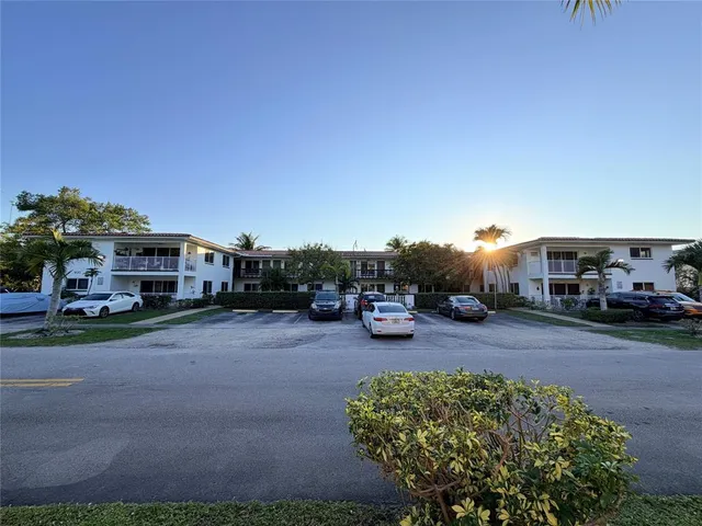 a car parked in front of a house